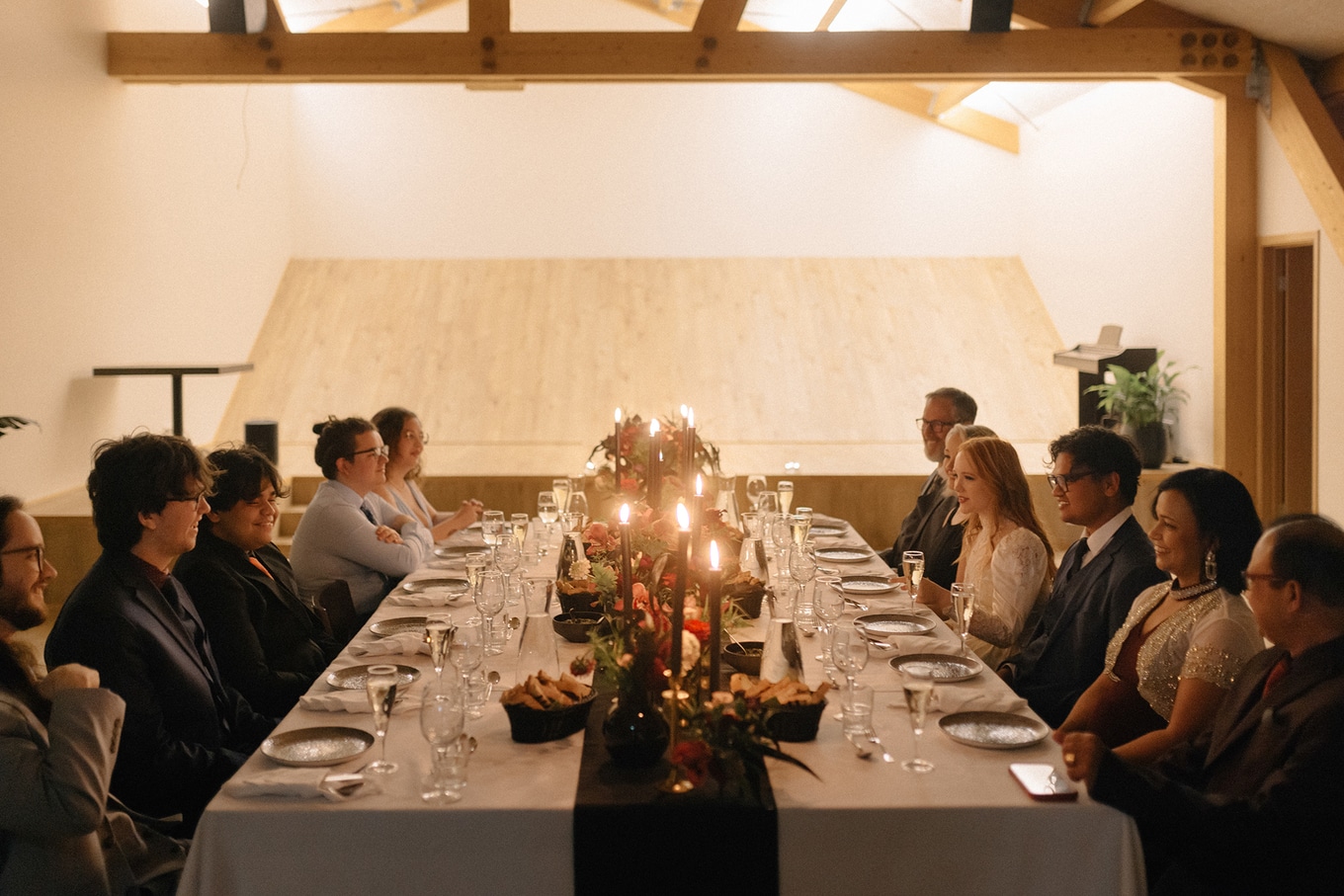 Emelyne and Bishal.reception.table wide shot